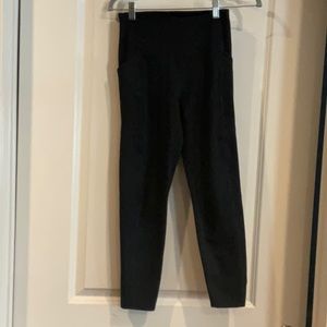 Girlfriend collective high waist leggings with pockets.